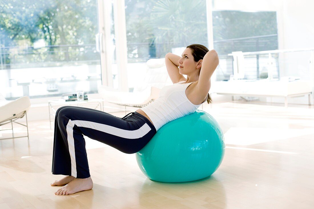 Woman using exercise ball