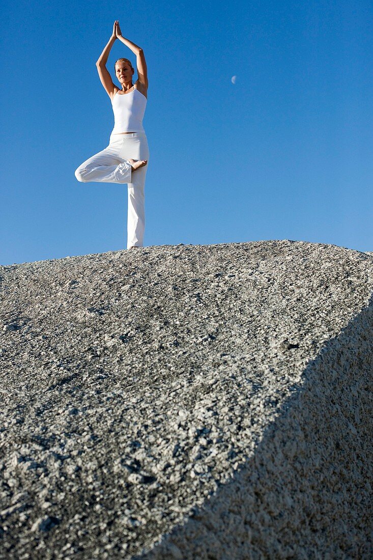 Woman performing yoga exercise