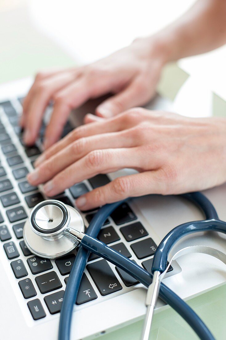 Nurse using a laptop computer