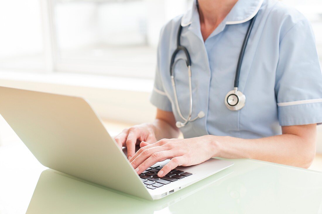 Nurse using a laptop computer