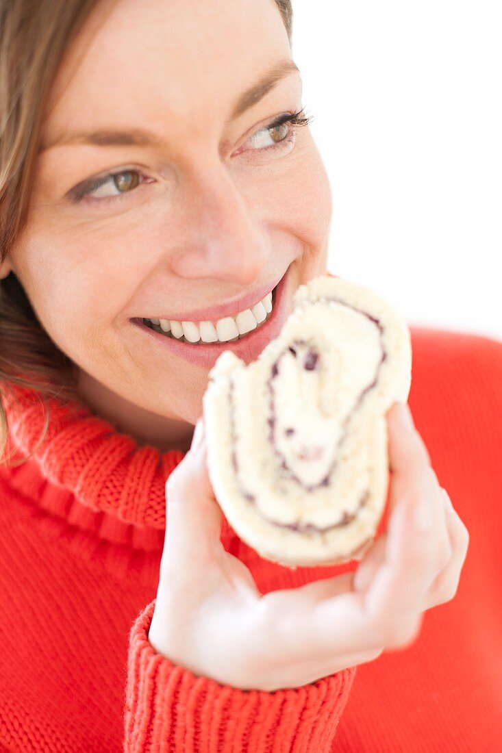 Woman eating cake