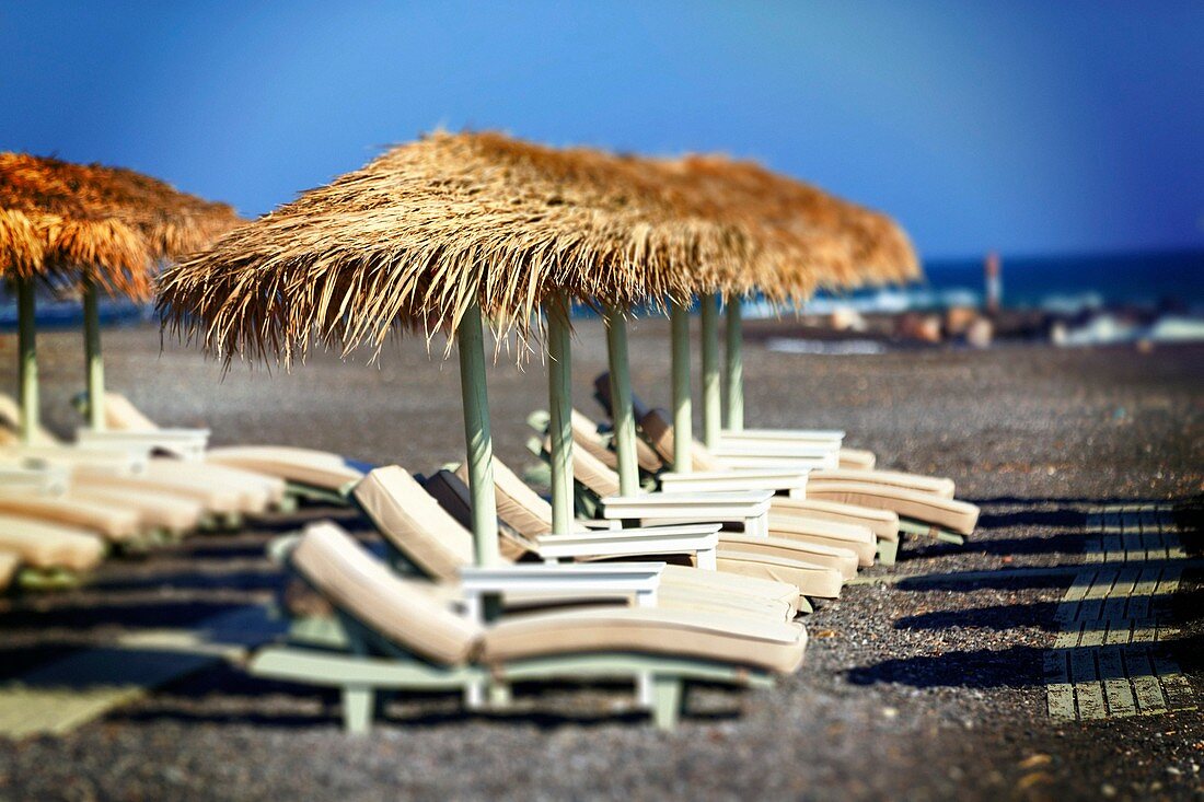 Parasols and sunloungers