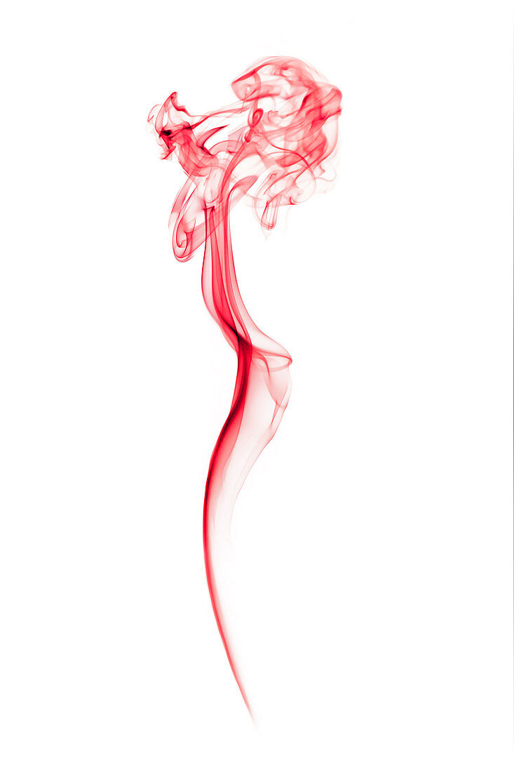 Red smoke against a white background