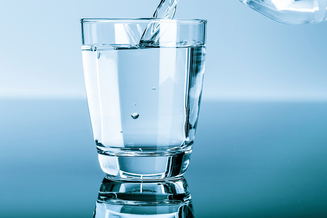 Water being poured into a glass