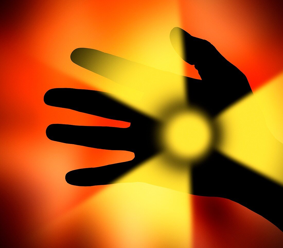 Hand and radiation symbol