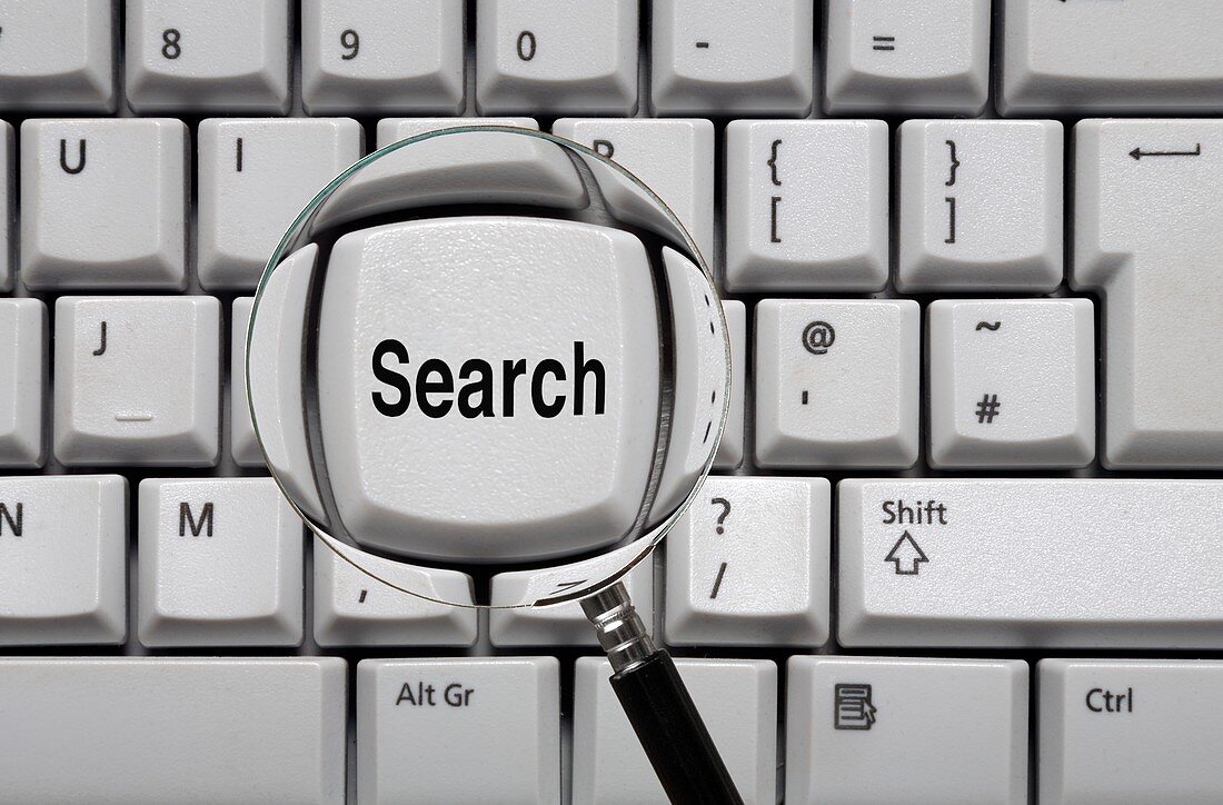 Magnifying glass and search key