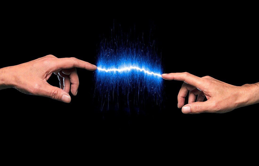 Fingers connected by blue sparks