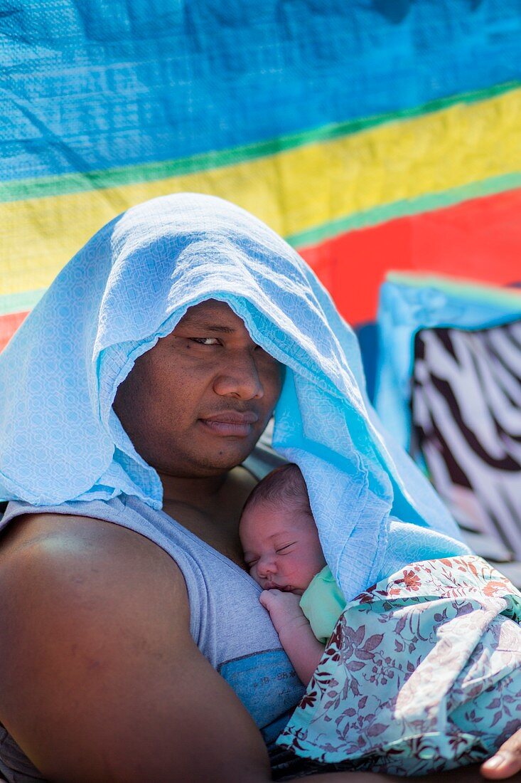 Mother holding baby