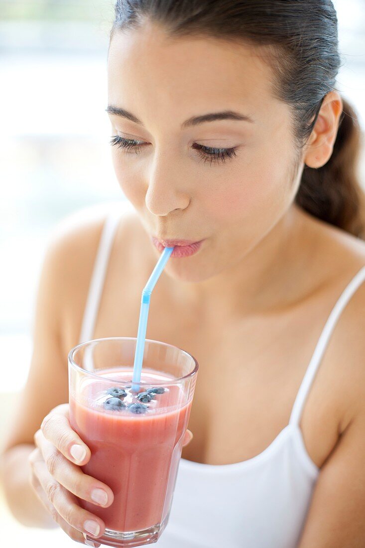 Woman with smoothie