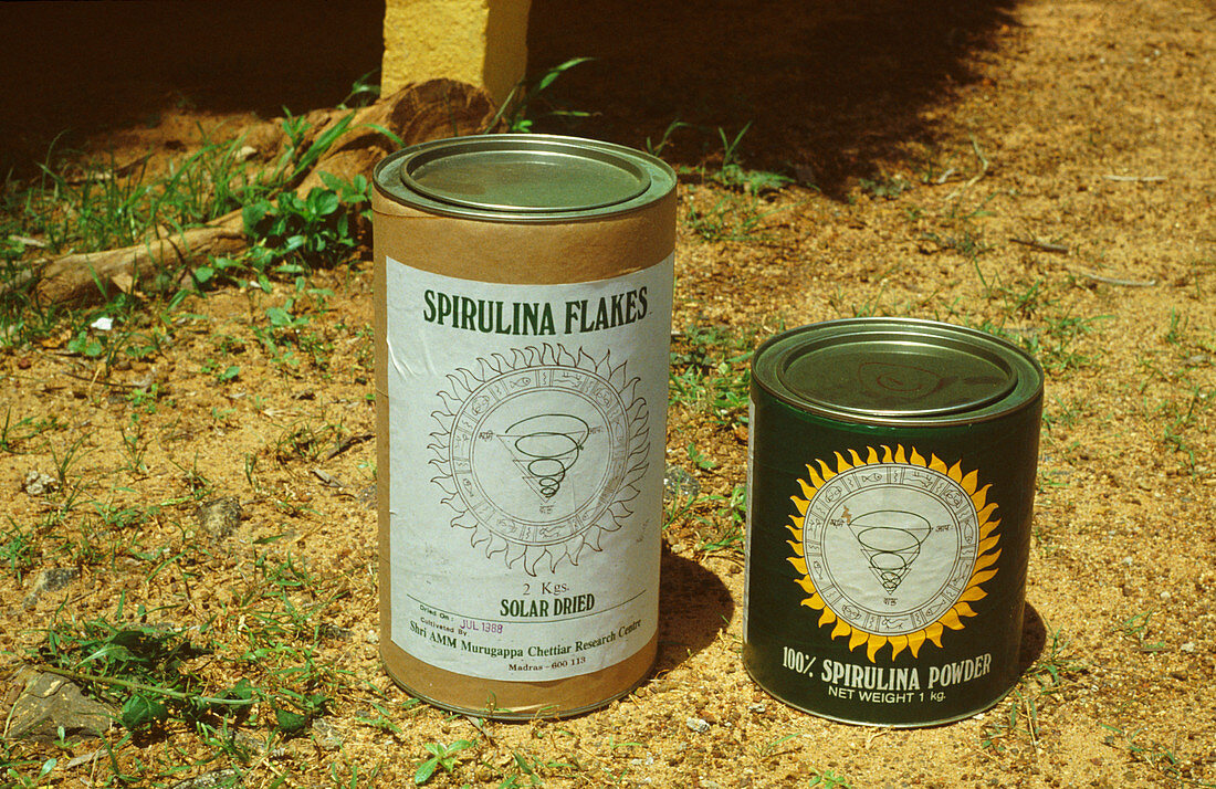 Cans of dried Spirulina algae