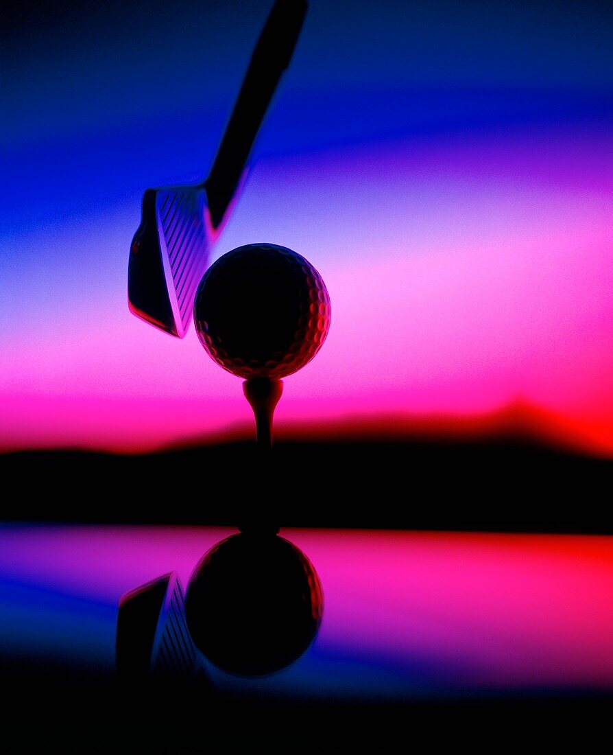 Close-up of golf club & ball