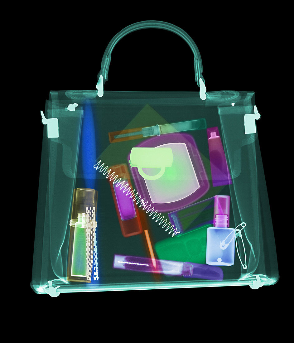 Coloured X-ray of woman's handbag showing contents
