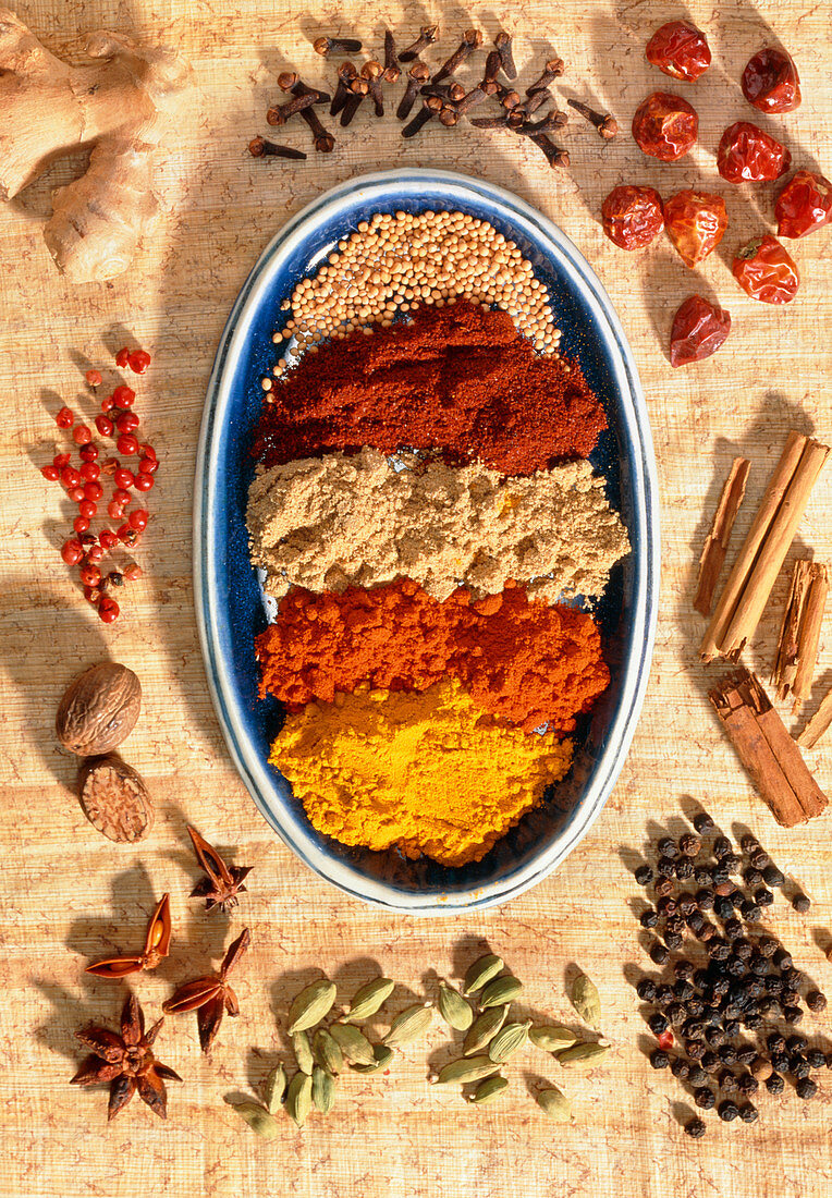 A collection of ground and whole spices