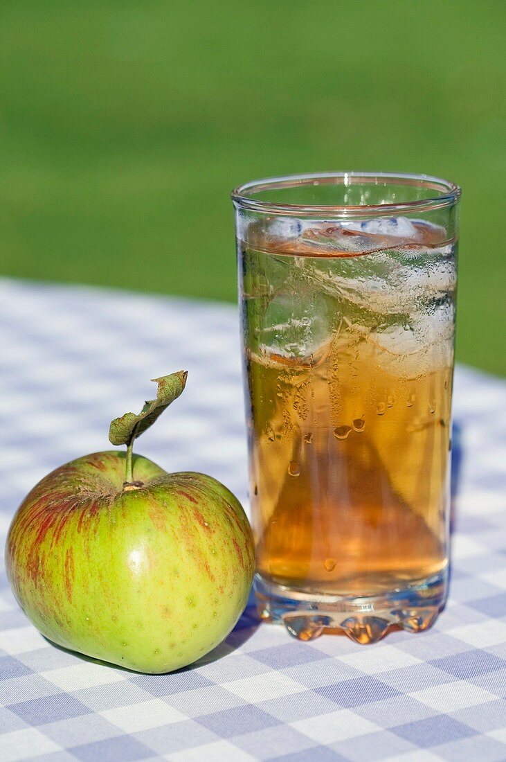 Apple and glass of apple juice
