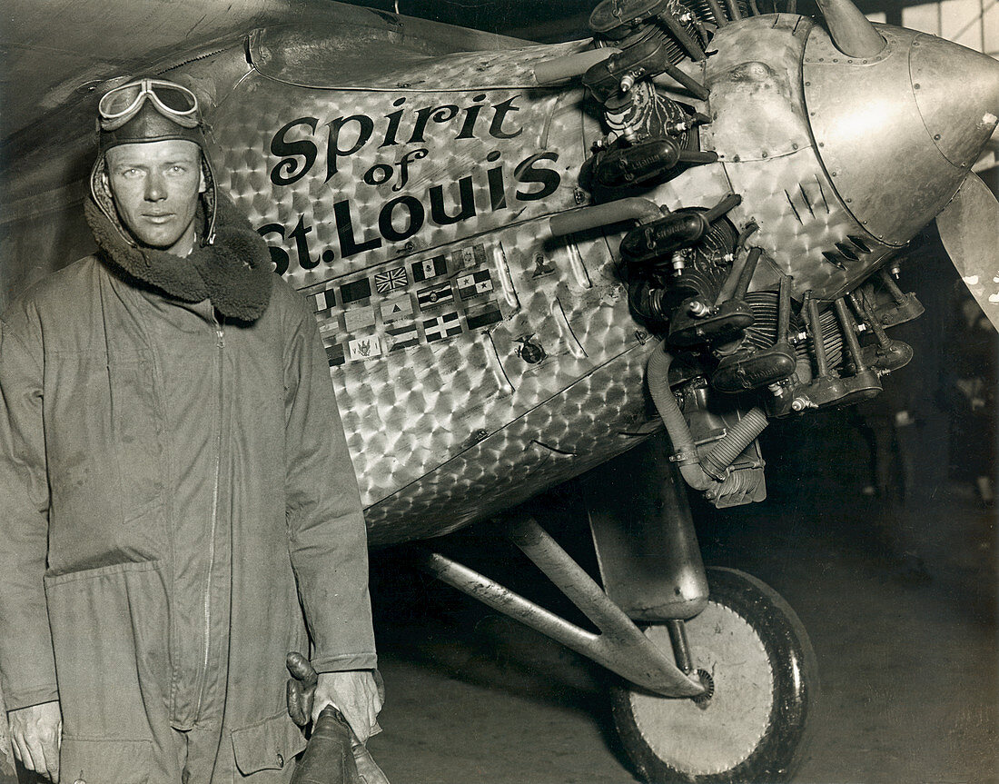 Lindbergh with his airplane,1928