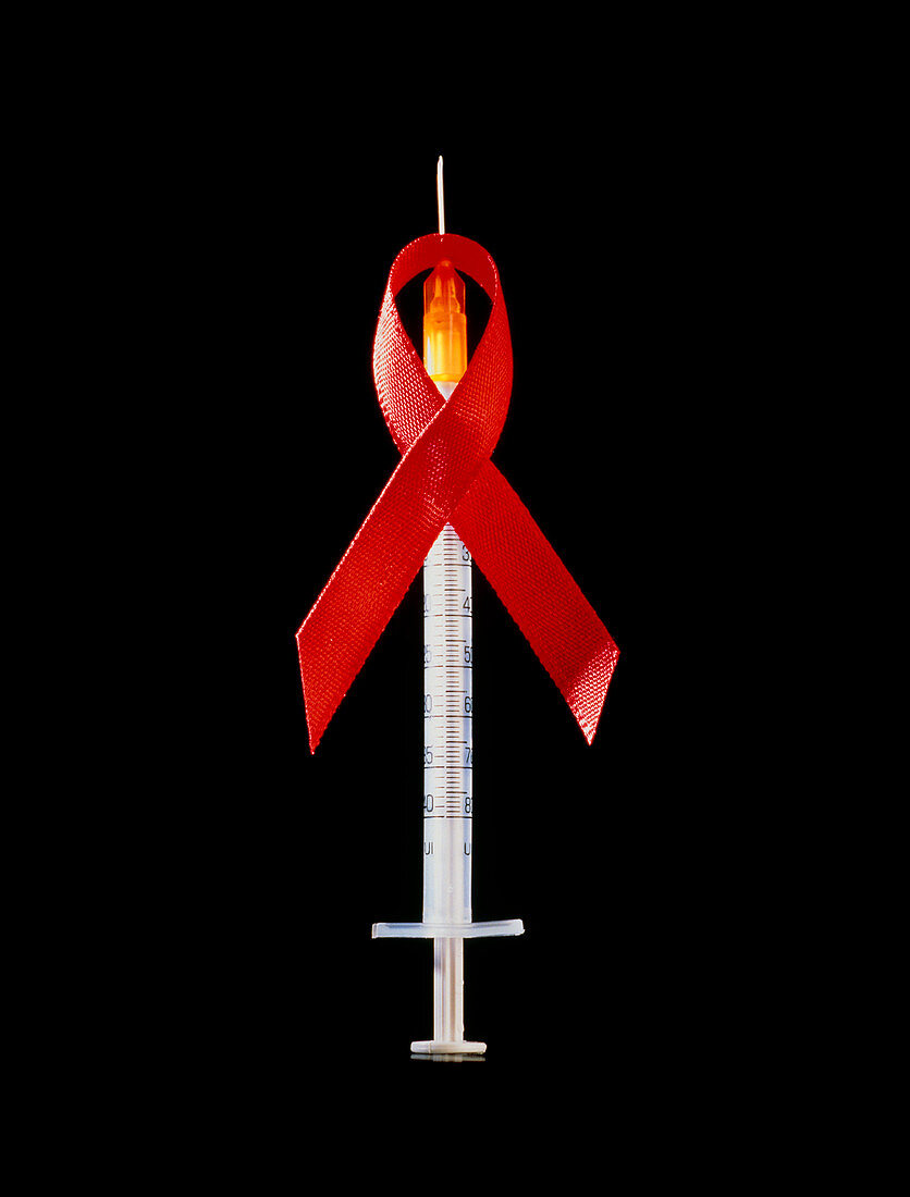 Drug abuse and AIDS: red ribbon around syringe