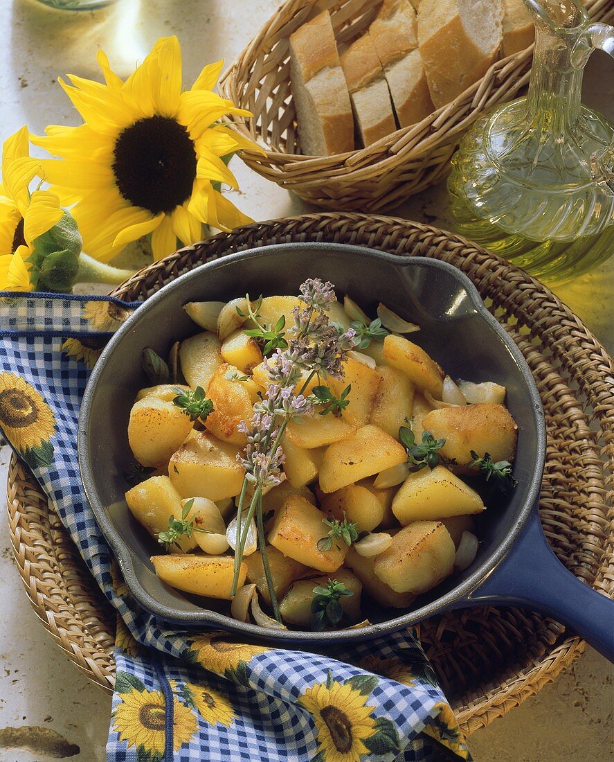 Provencal fried potatoes with thyme in bowl