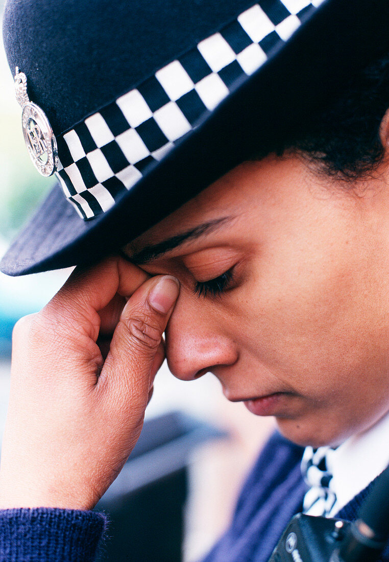 Stressed policewoman