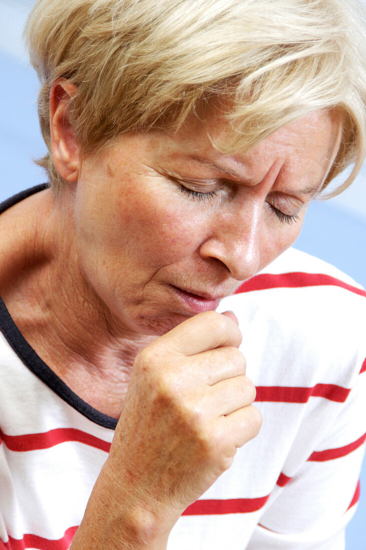 Woman coughing