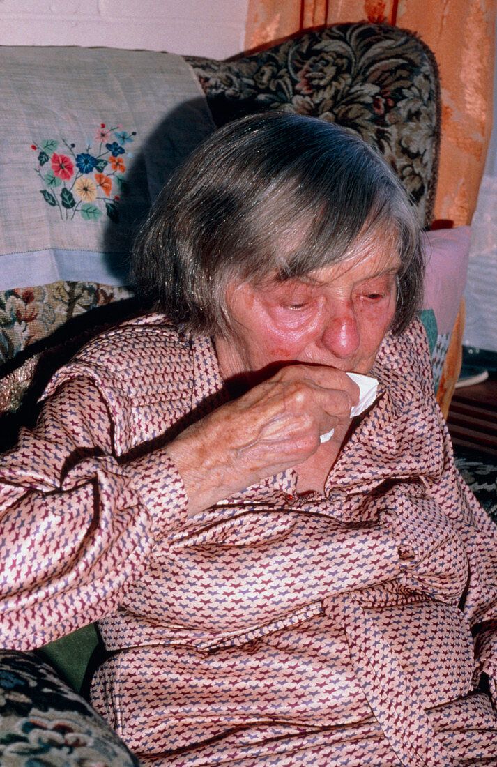 Elderly woman crying