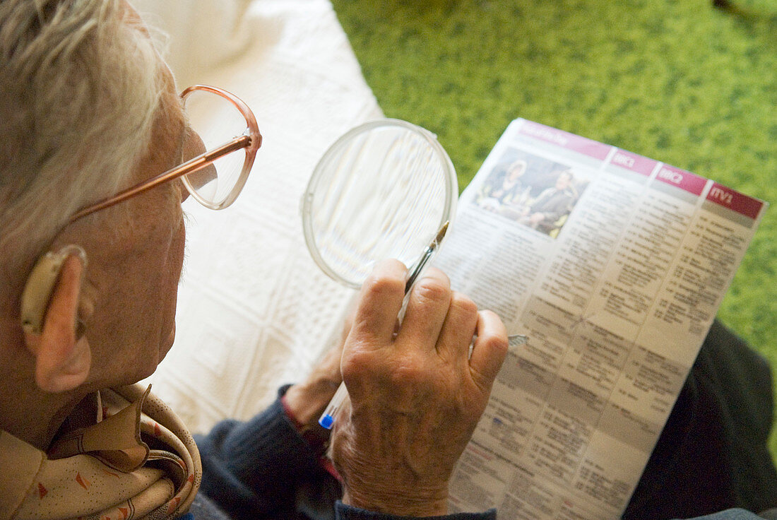Elderly man reading