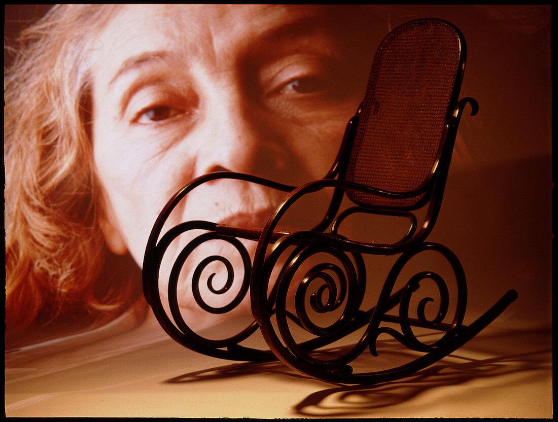 Aging: elderly woman's face and a rocking chair