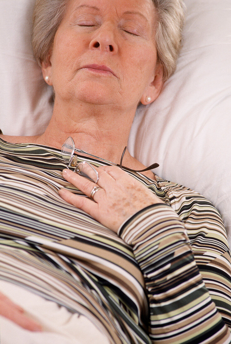 Elderly woman resting