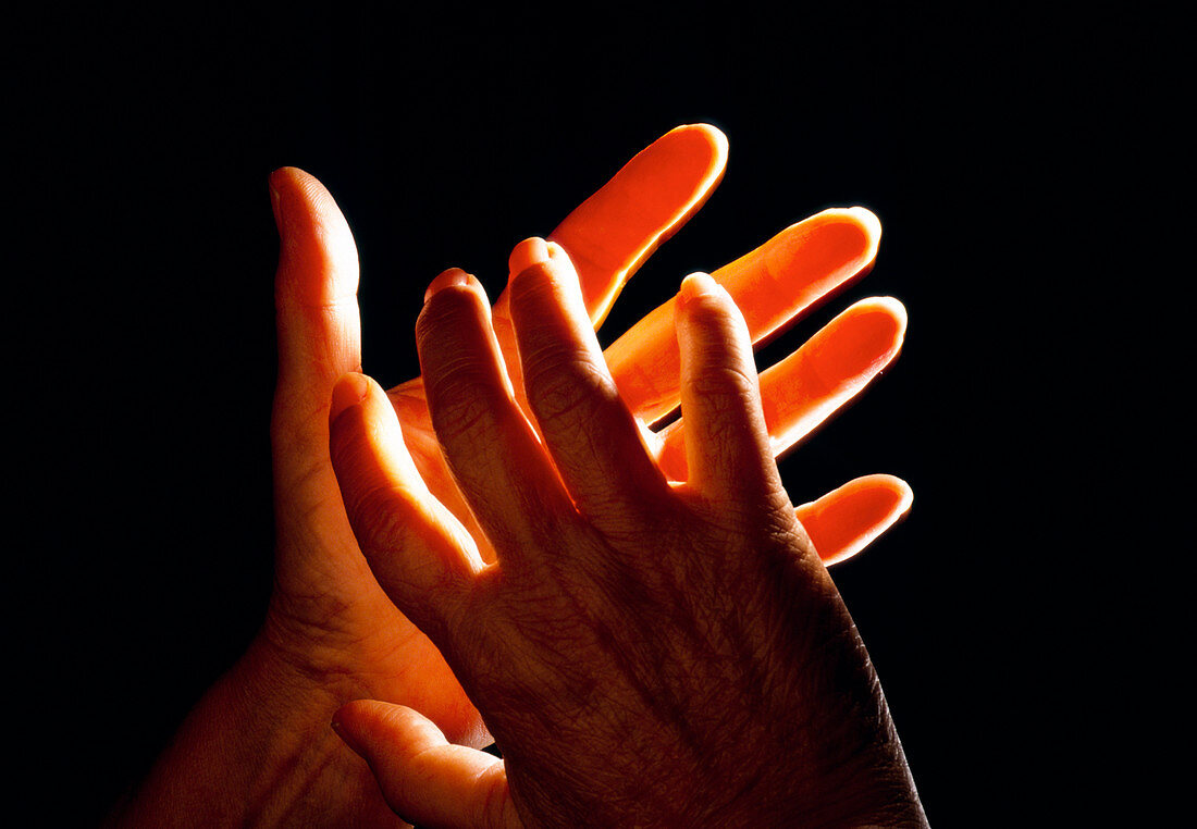 View of hands using sign language