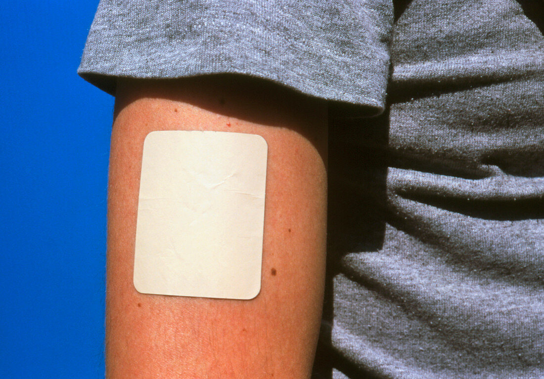 View of a nicotine patch on a man's arm