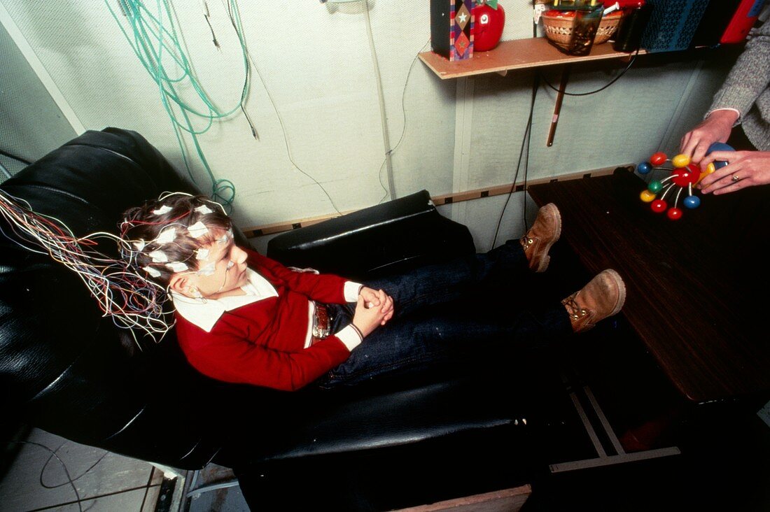 Young boy undergoes EEG examination