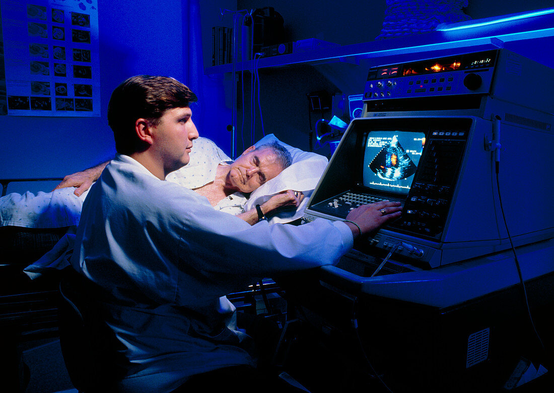 Doctor performing echocardiography on patient