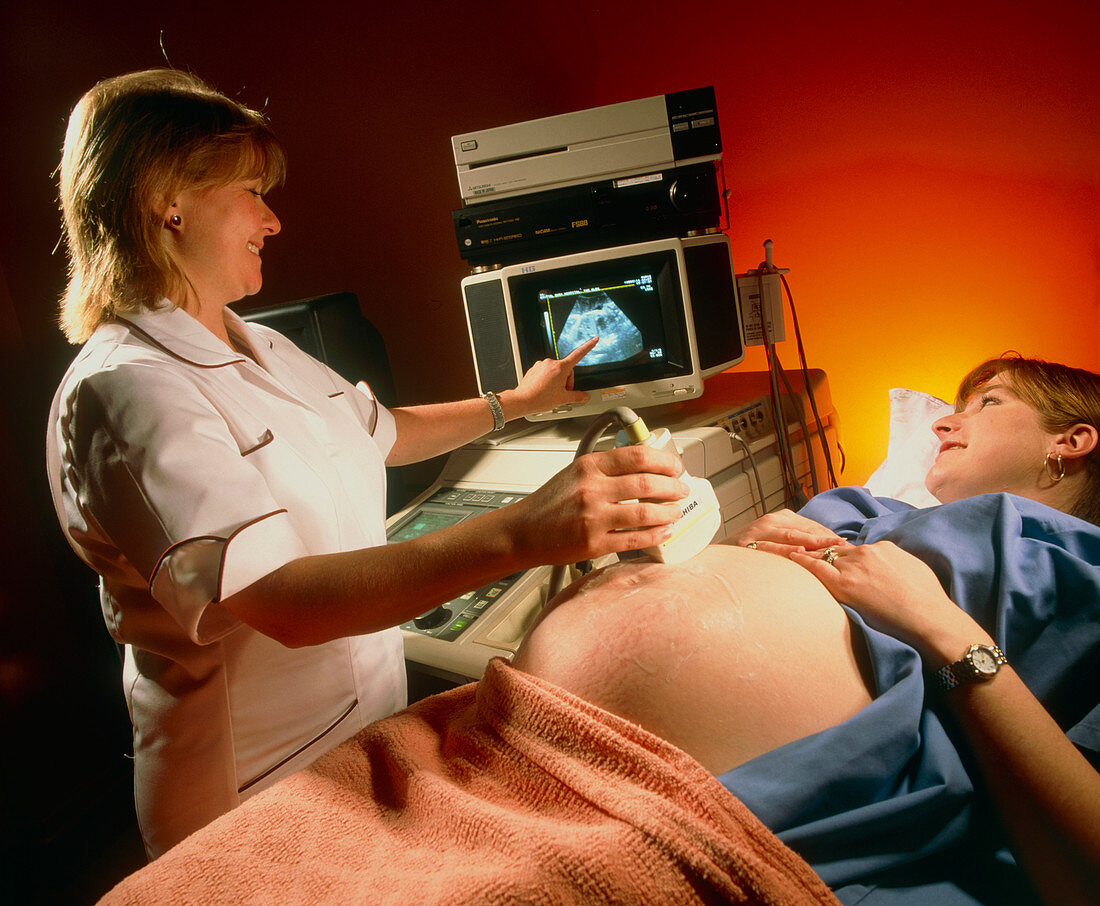 Pregnant woman in an ultrasound scanning suite