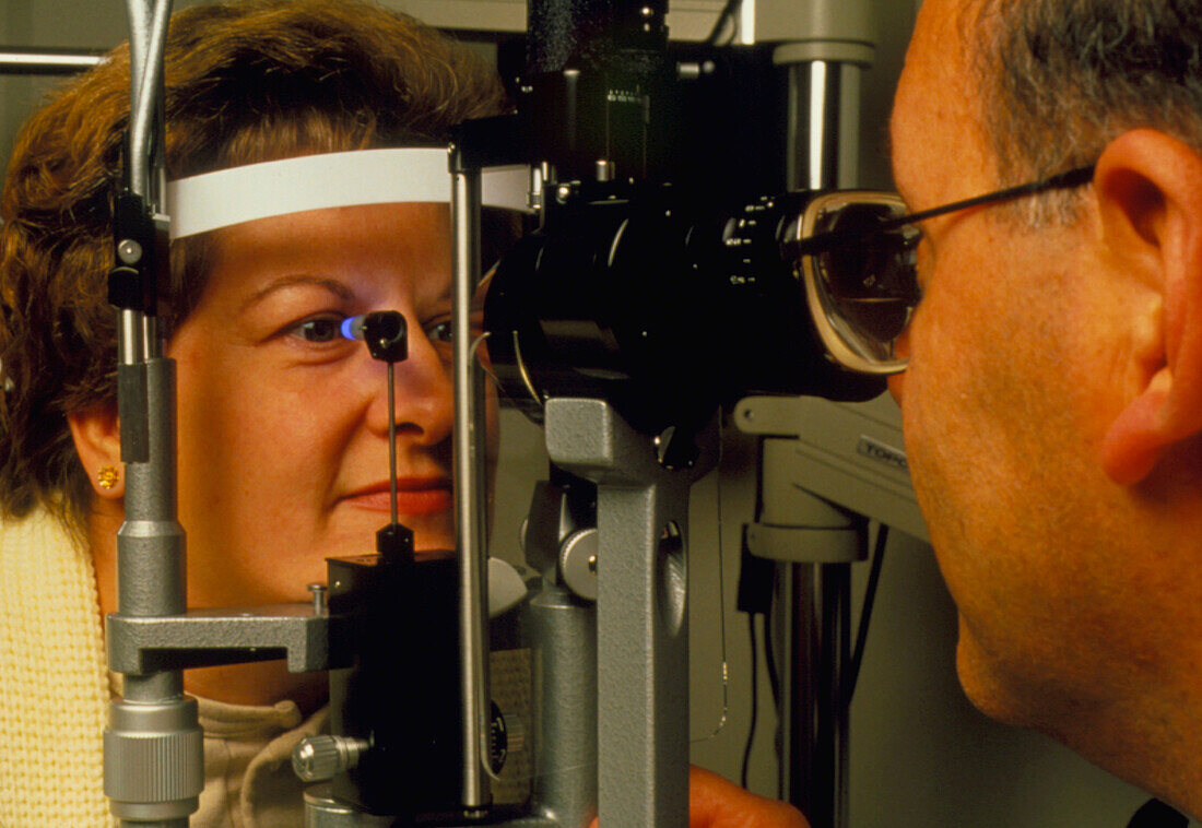 Ophthalmoscope examination of a woman's eyes
