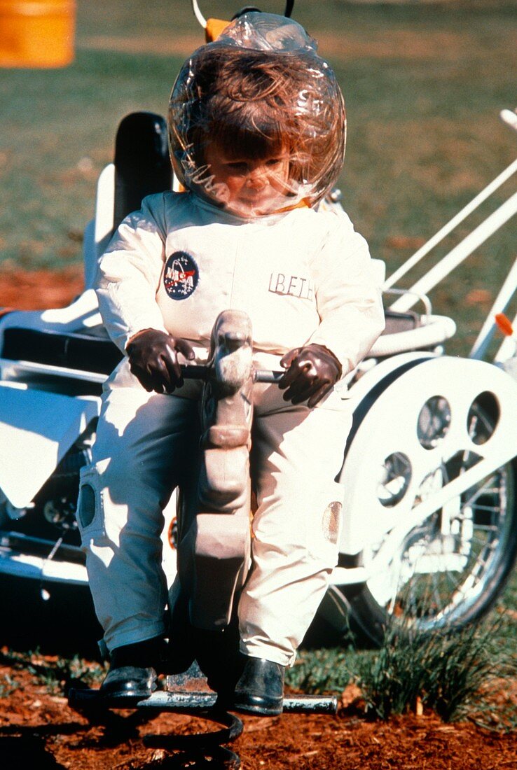 Child wearing mobile biological isolation garment