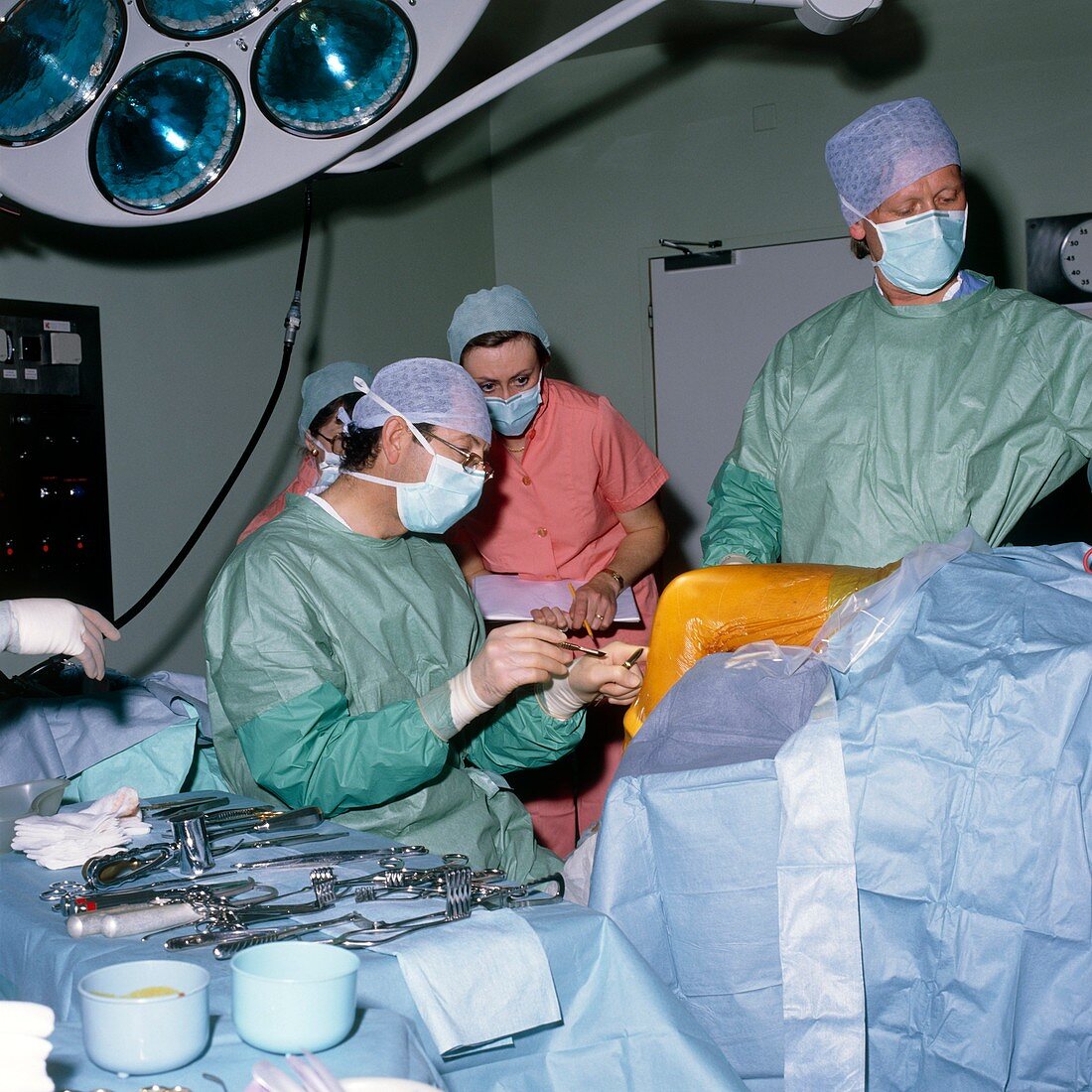 Orthopaedic surgeon and assistants