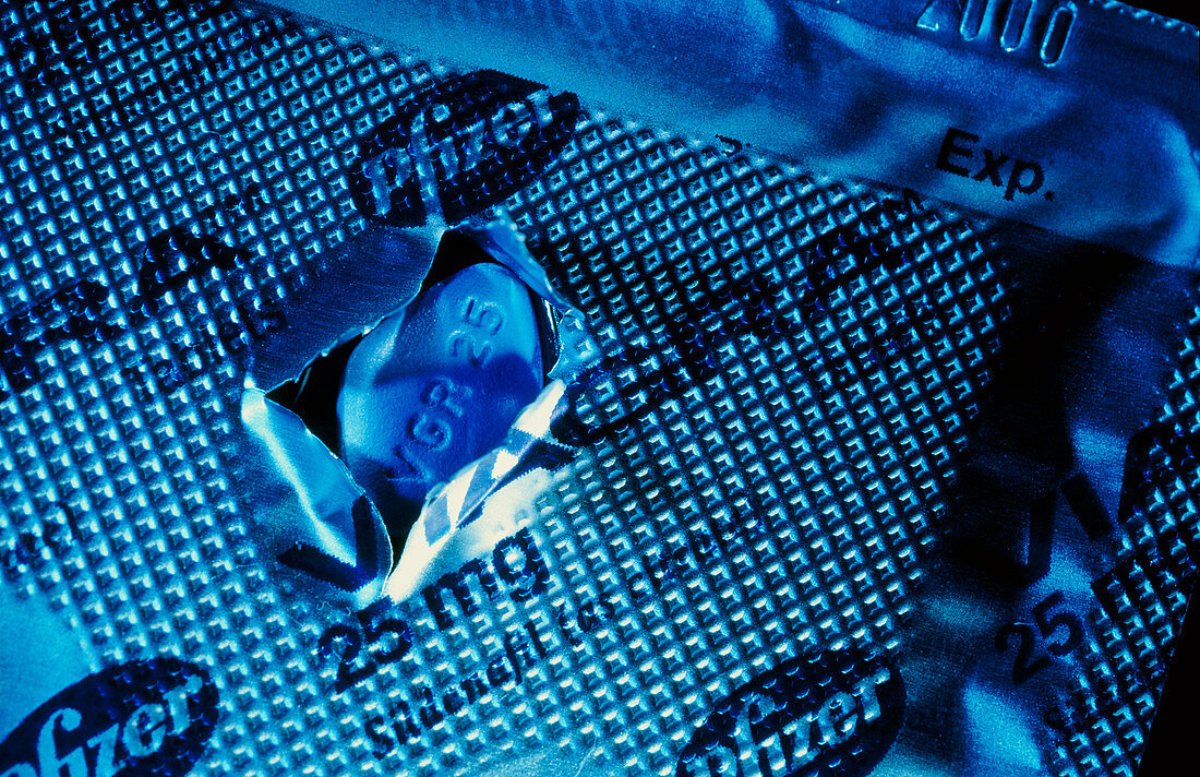 Blue Viagra pill and its metal foil packaging