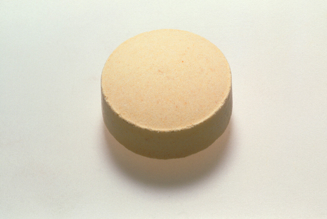 A pill of folic acid (vitamin B complex)