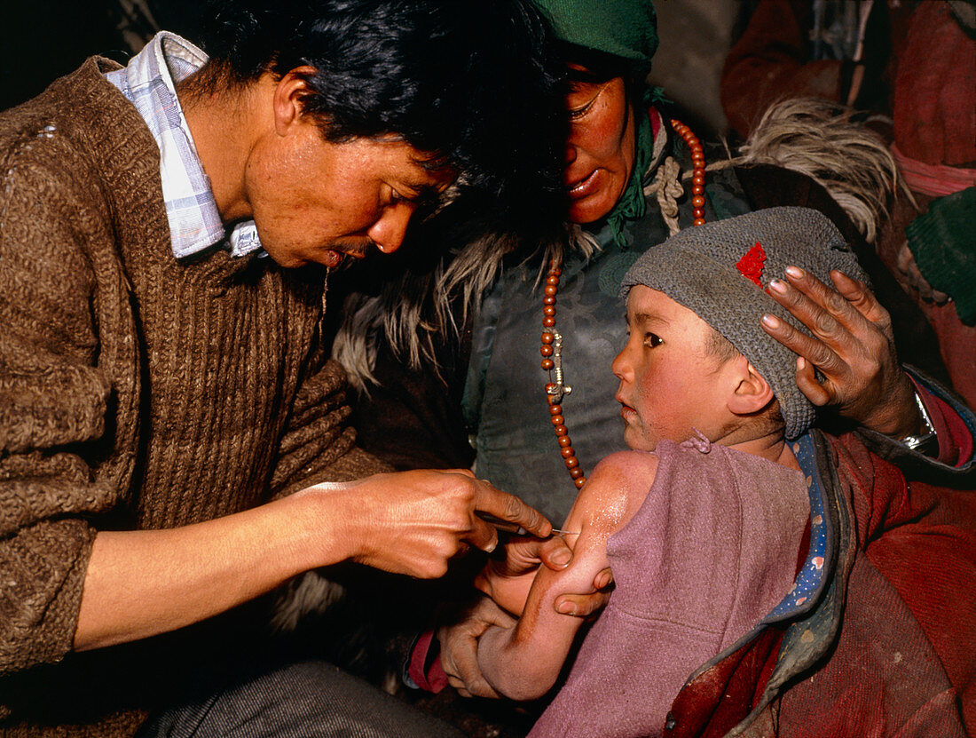 Child being given measles vaccine,India