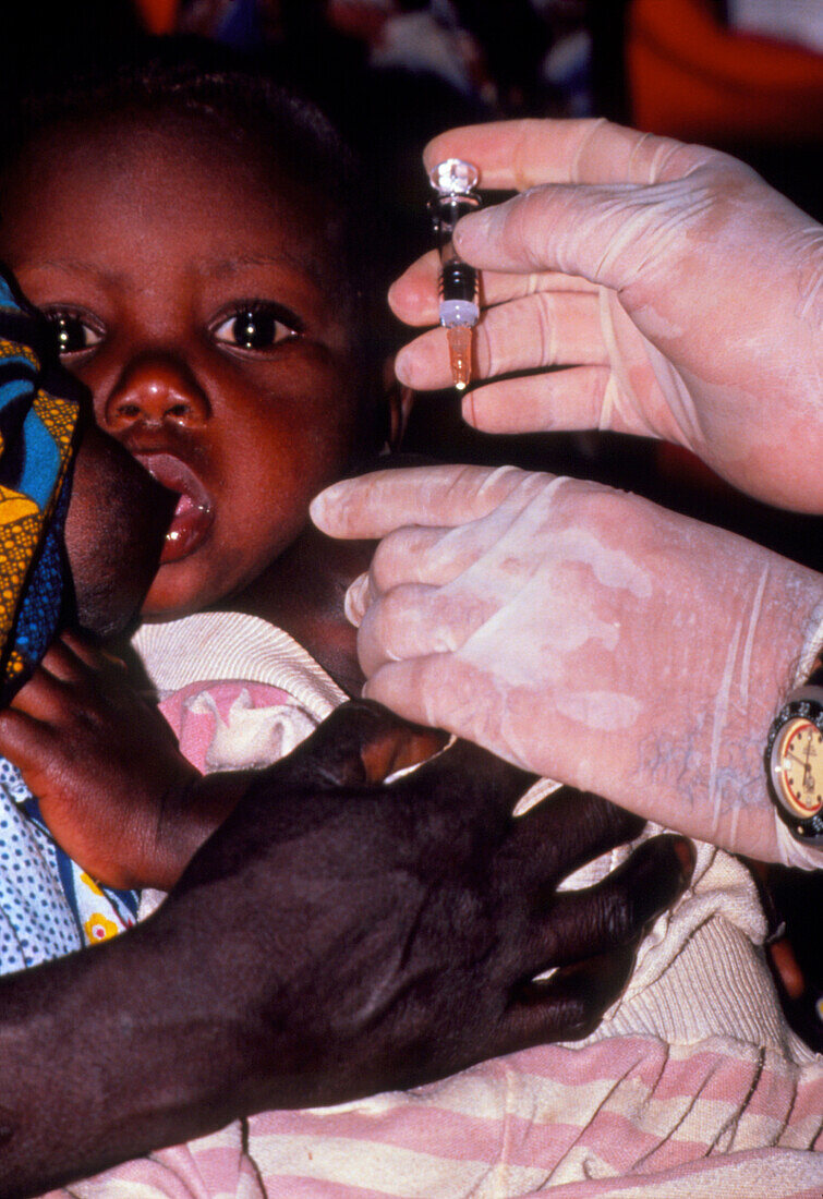 Experimental malaria vaccine given to African baby
