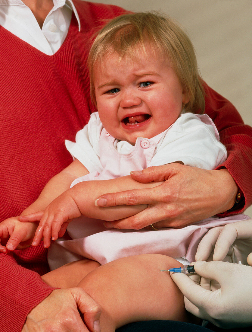 Baby recieving MMR vaccine and crying