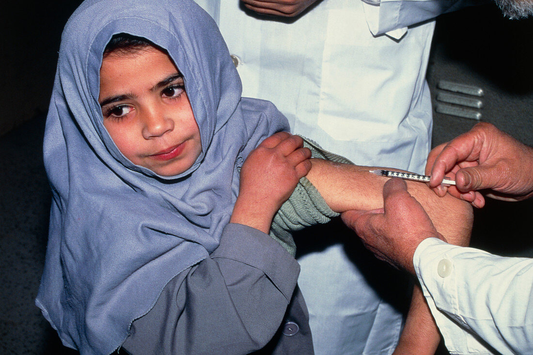 Girl receiving a leishmaniasis vaccine
