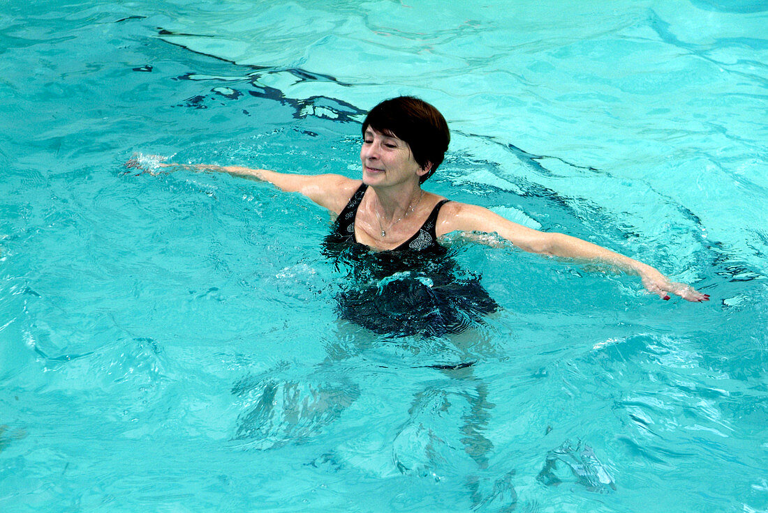 Woman doing aqua aerobics