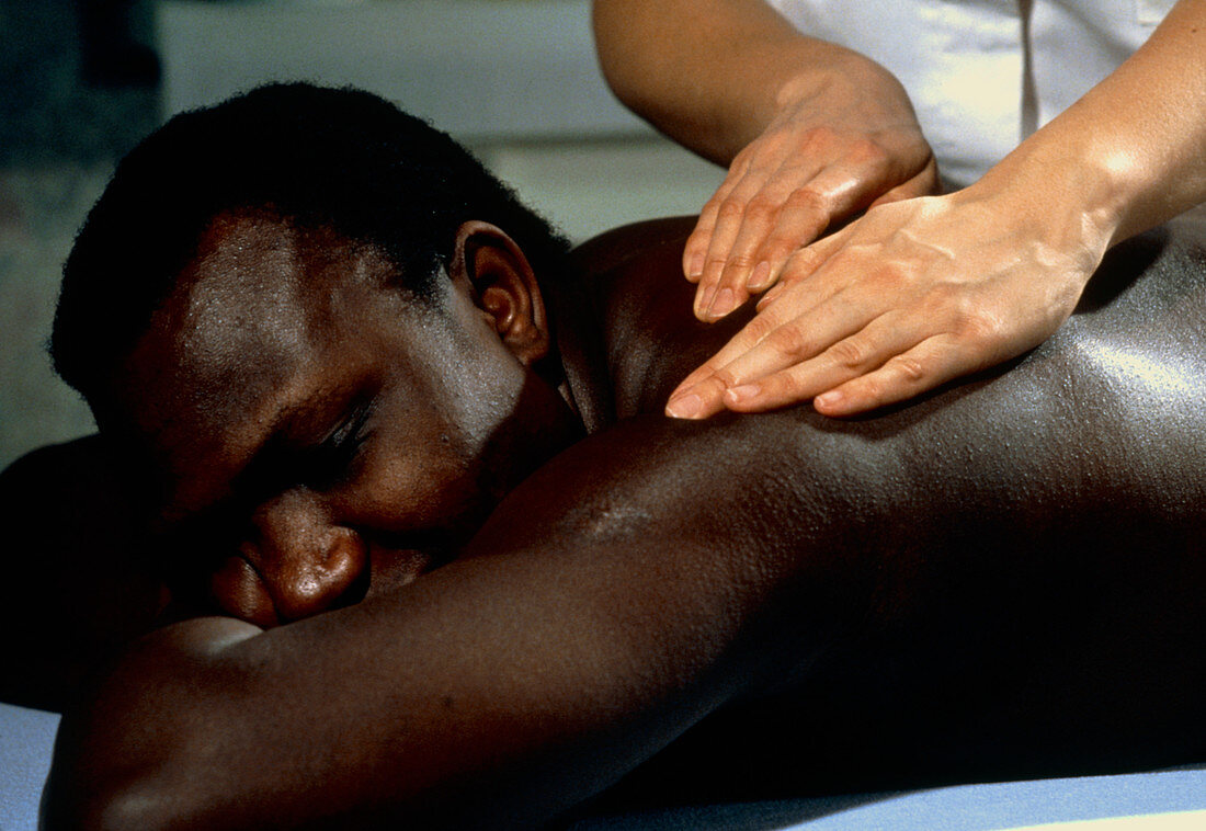 Man being given an aromatherapy massage