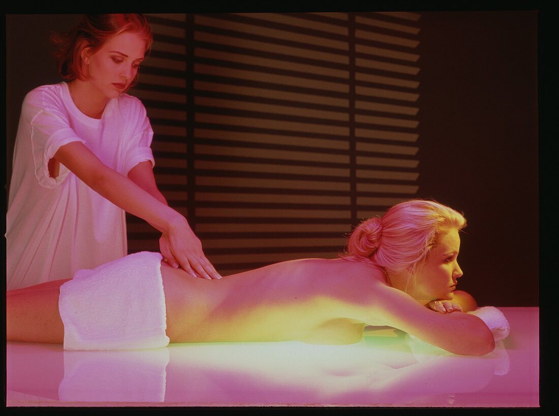 Woman undergoing a back massage