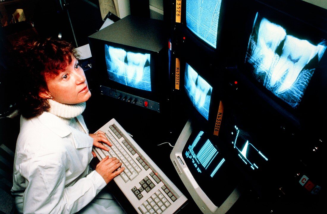 Dentist using digital subtraction radiography