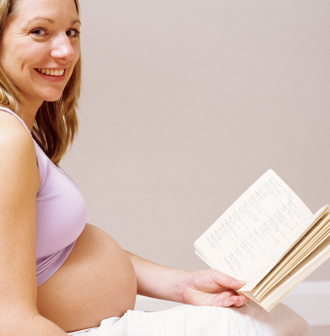 Pregnant woman reading