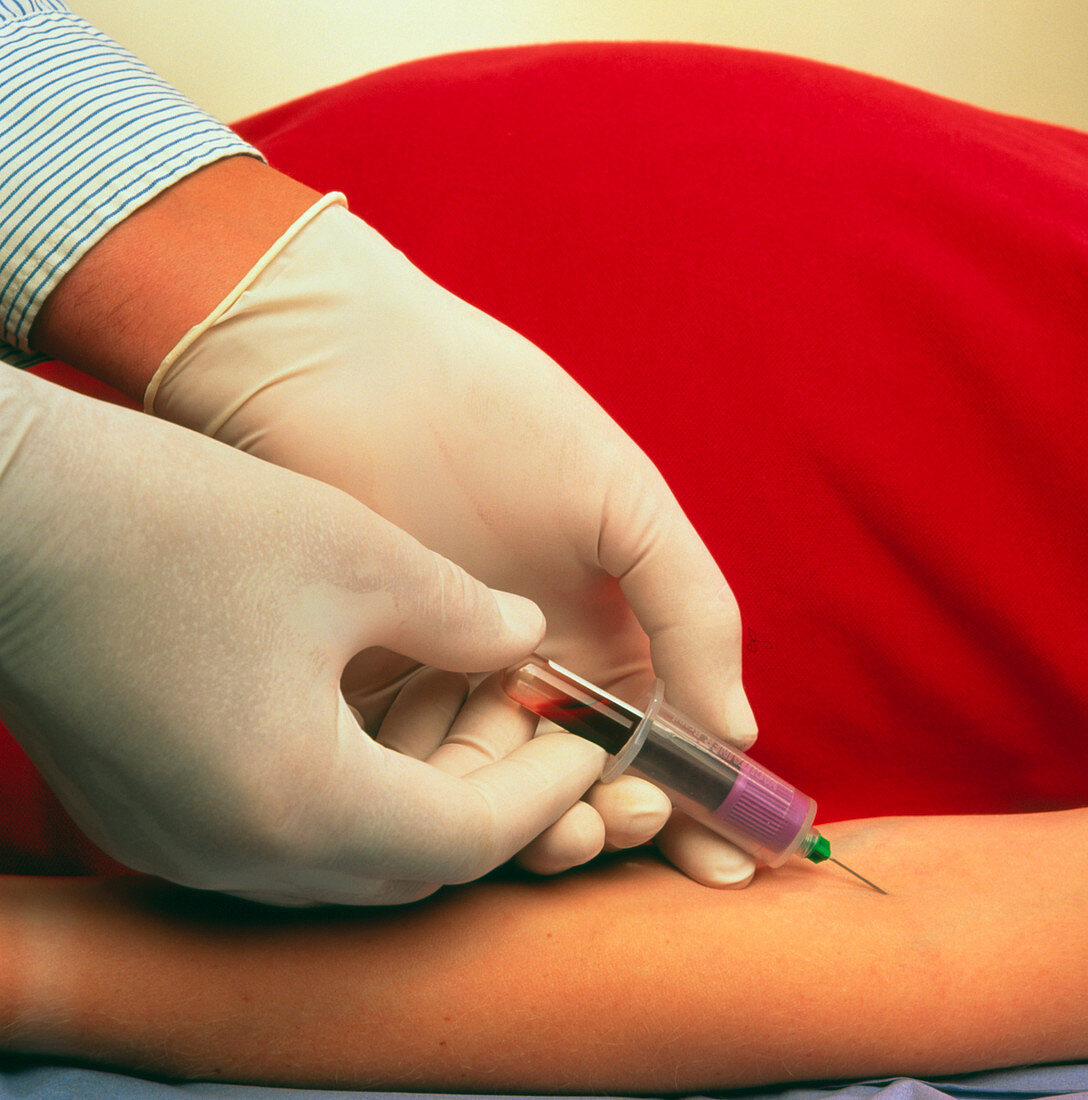 Blood sample being taken from pregnant woman