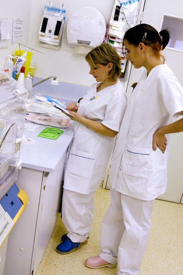 Nurses reading instructions