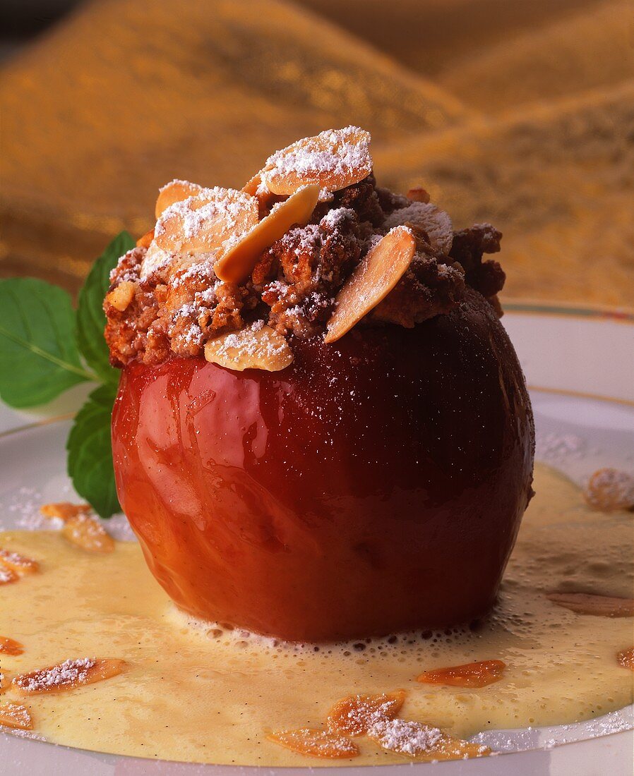 Baked apple with marzipan and almond filling & vanilla sauce