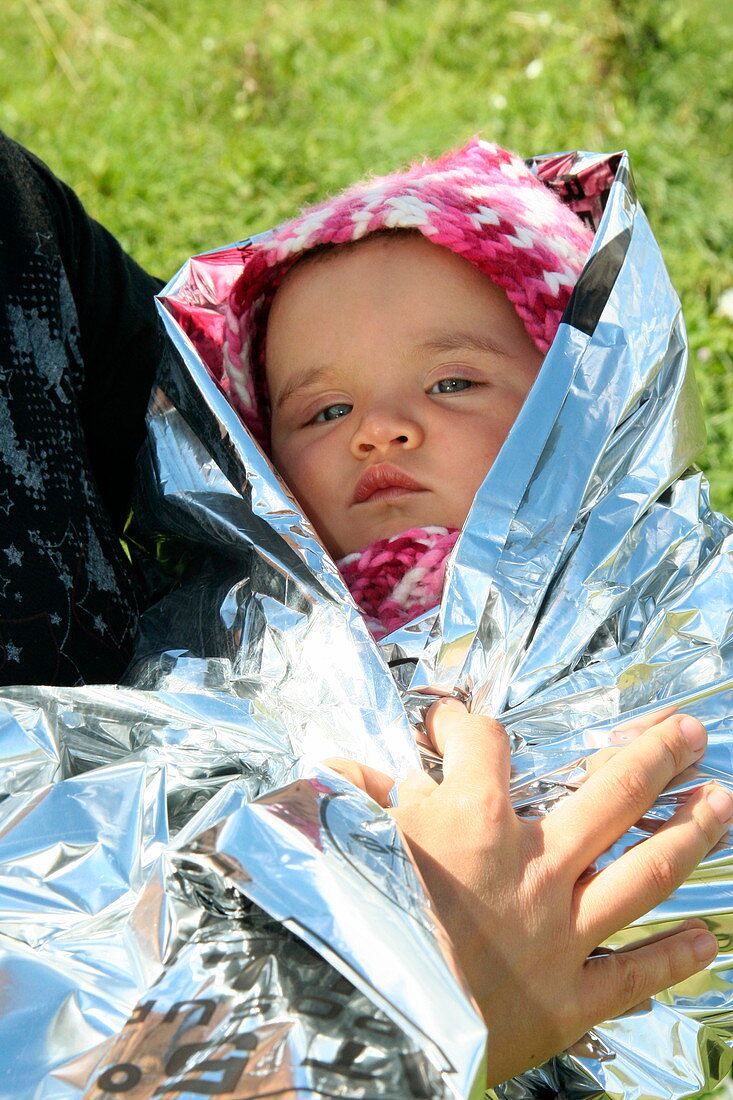 Baby in thermal blanket